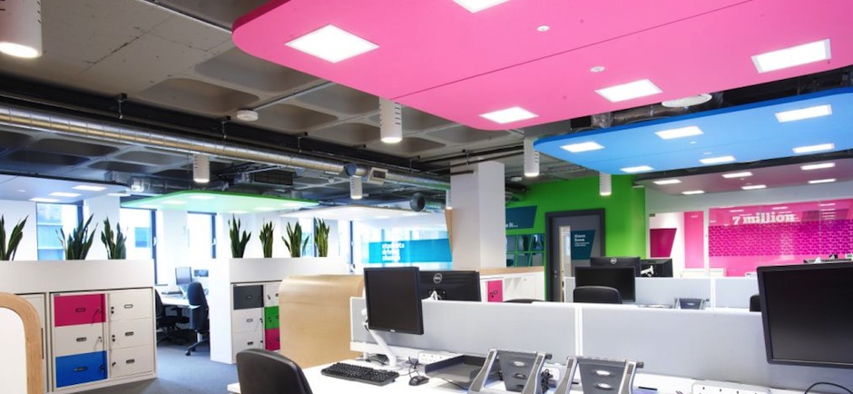 open plan office with bright ceiling panels